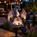 Crystal dragon solar garden light beside a garden pond